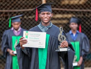 Stephen Ongoma, a graduate of the Safaricom Youth Orchestra during its 6th graduation ceremony that saw thirty students graduating in a virtual ceremony. Stephen plays the Violin.